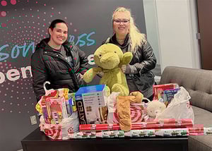 adopt a family volunteers with toys