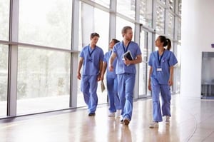 healthcare professionals walking in a group