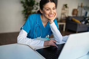 healthcare worker on computer