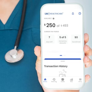 nurse holding smart phone with the Immediate Pay app