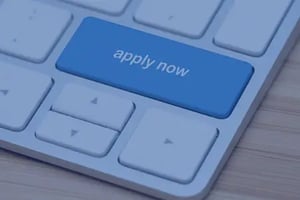 a key board with a blue key that reads apply now