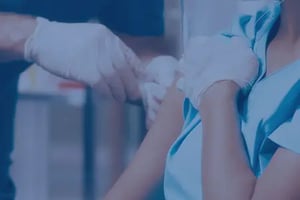 nurses giving vaccine