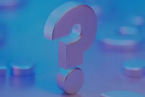 pink question mark on a teal background